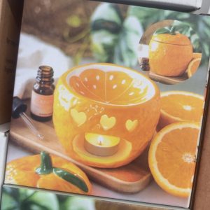 Orange tea light burner